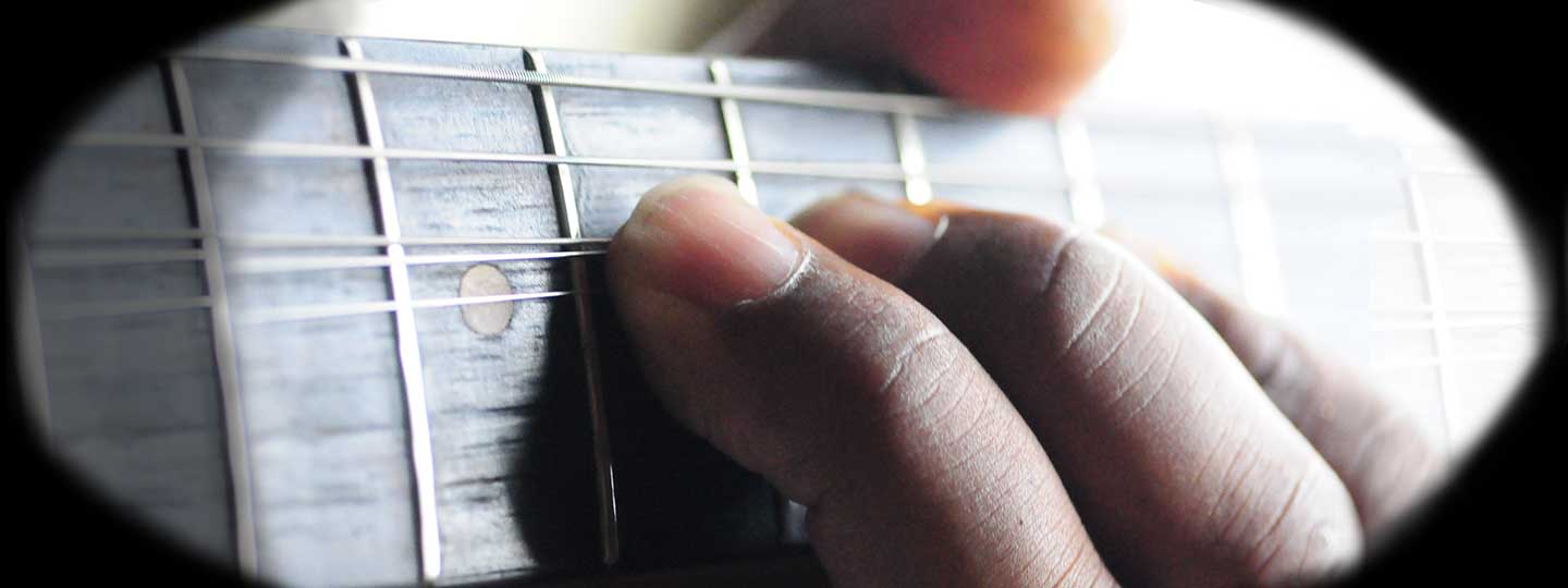 A fretboard of a guitar